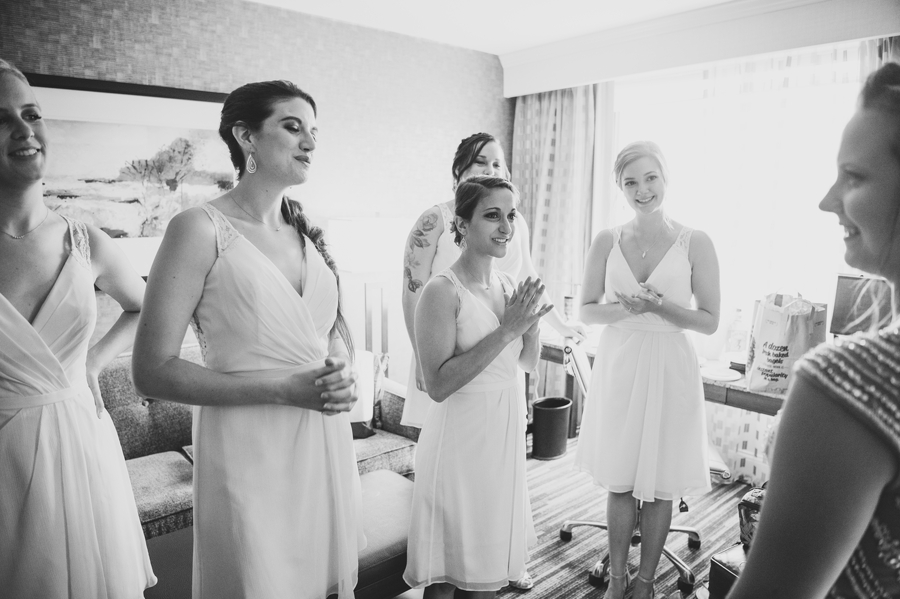 brides first look with bridesmaids 