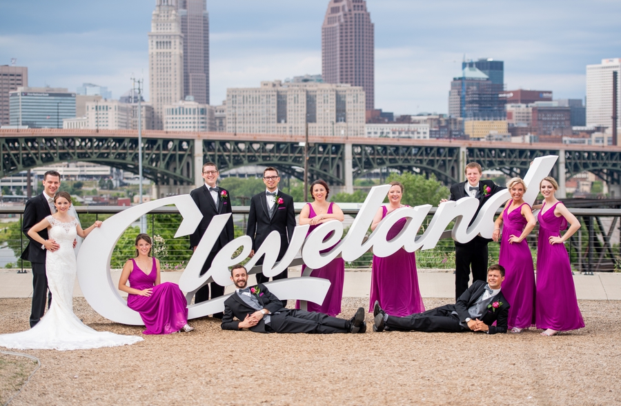 bridal party with cleveland sign 