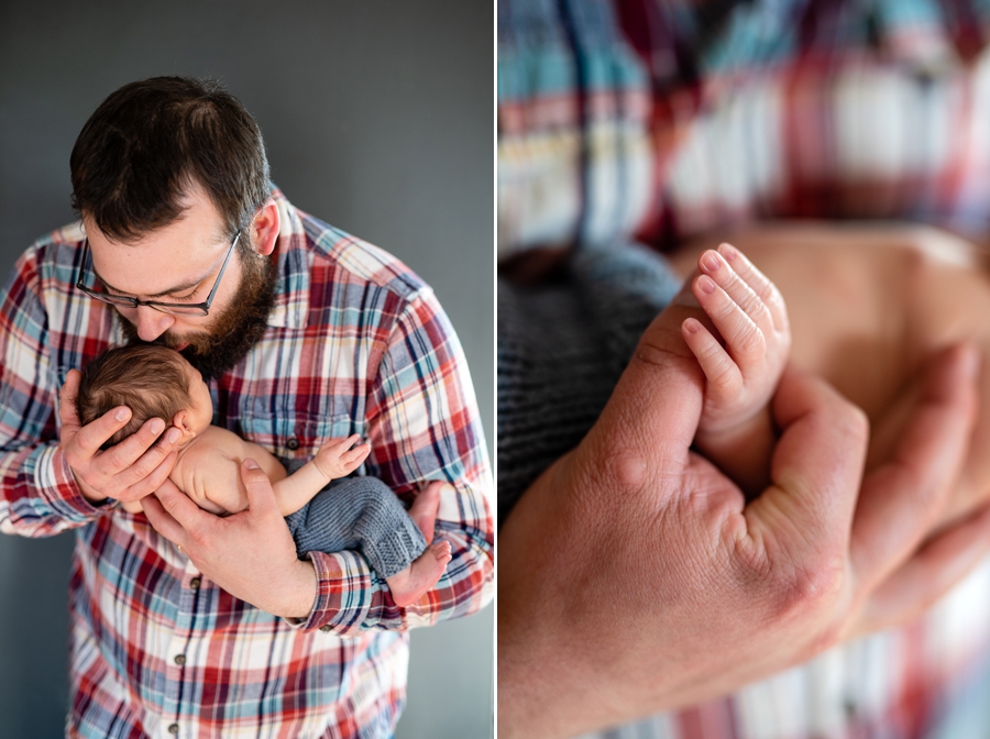 baby hands with dad
