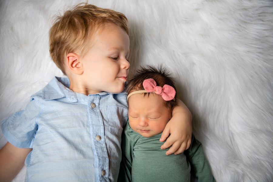 brother and sister In home newborn session 