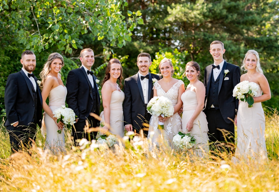 bridal party in field 