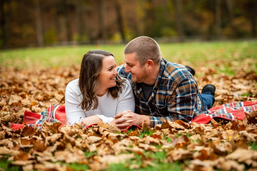 engagement photos in Fall leaves 